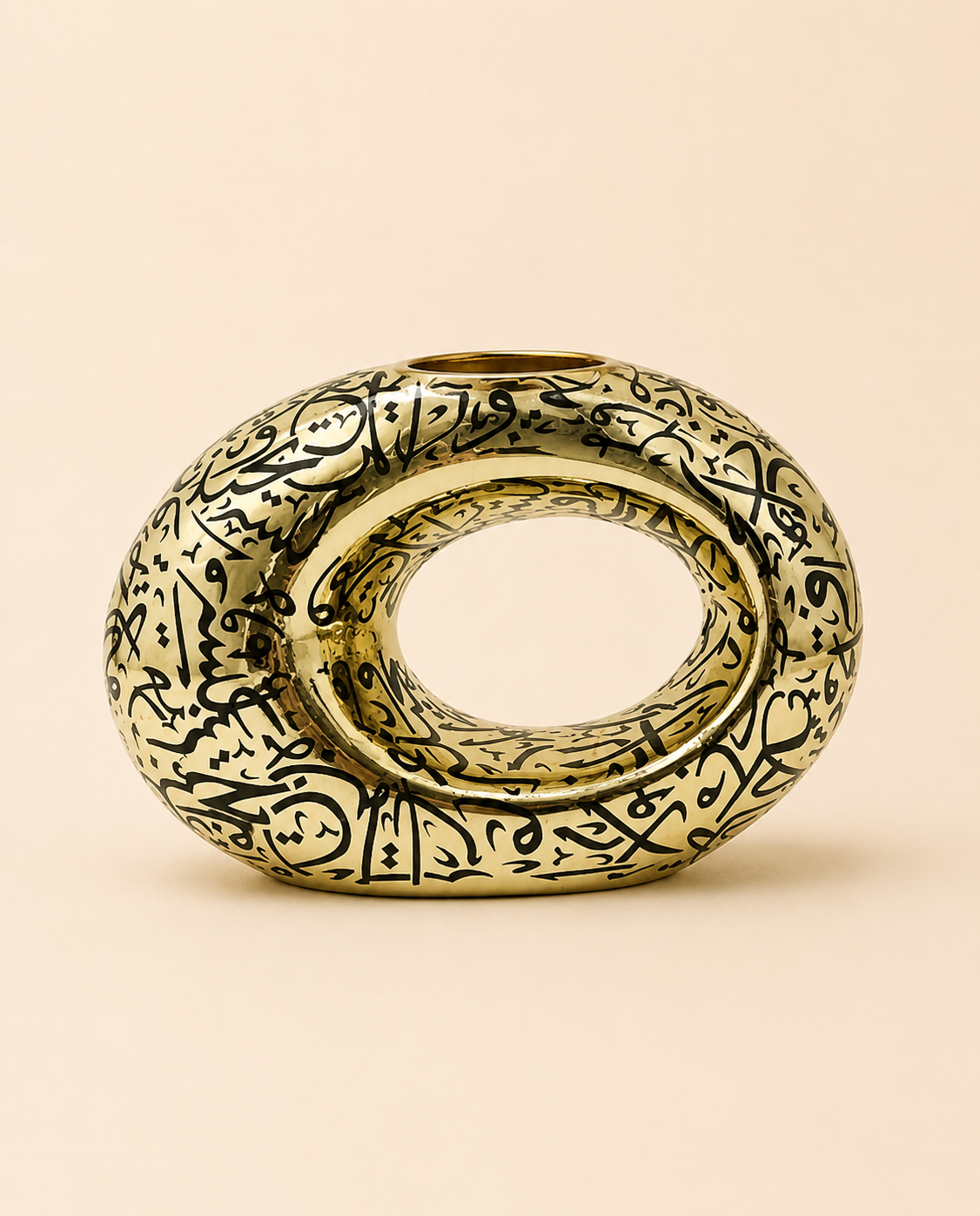 Luxury golden bakhoor stand with black Arabic calligraphy by Arafaan